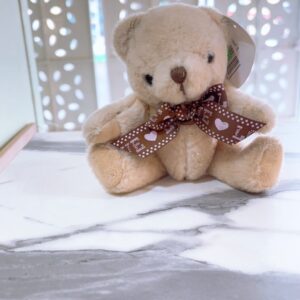 Osito beige con lazo