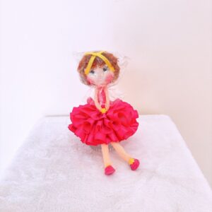 Muñeca de color fucsia