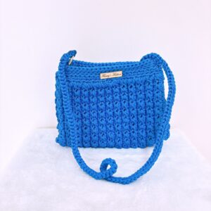Cartera tejida celeste