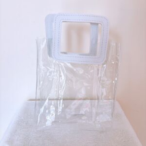 Funda transp. agarradera blanca mediana