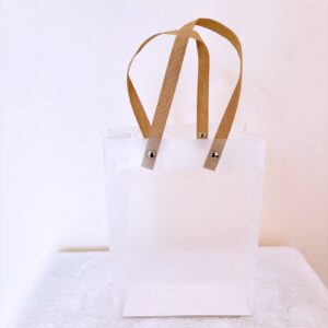 Funda transp. agarradera de asa