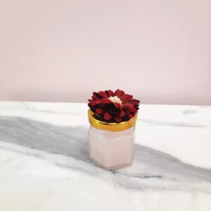 Vela peq con una Flor