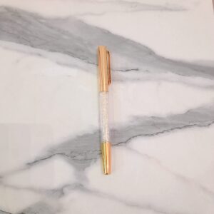 Esfero dorado con brillantes
