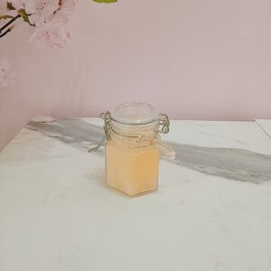 Vela en frasco de vidrio