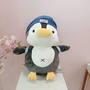 Peluche pingüino c/gorro azul